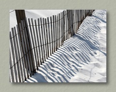 White sand and fence